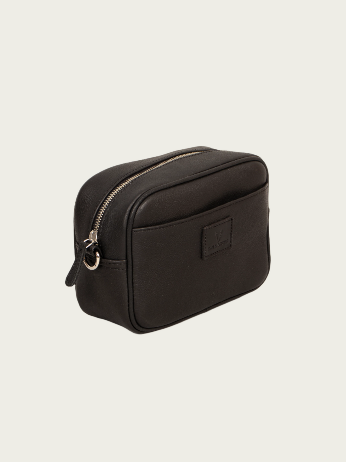 Stylish black sling bag side profile with adjustable strap