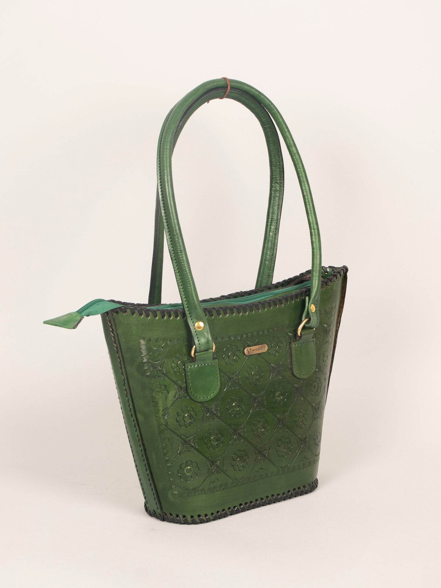 side view of stylish genuine leather shoulder bag for women, Tan & Brown designer collection.