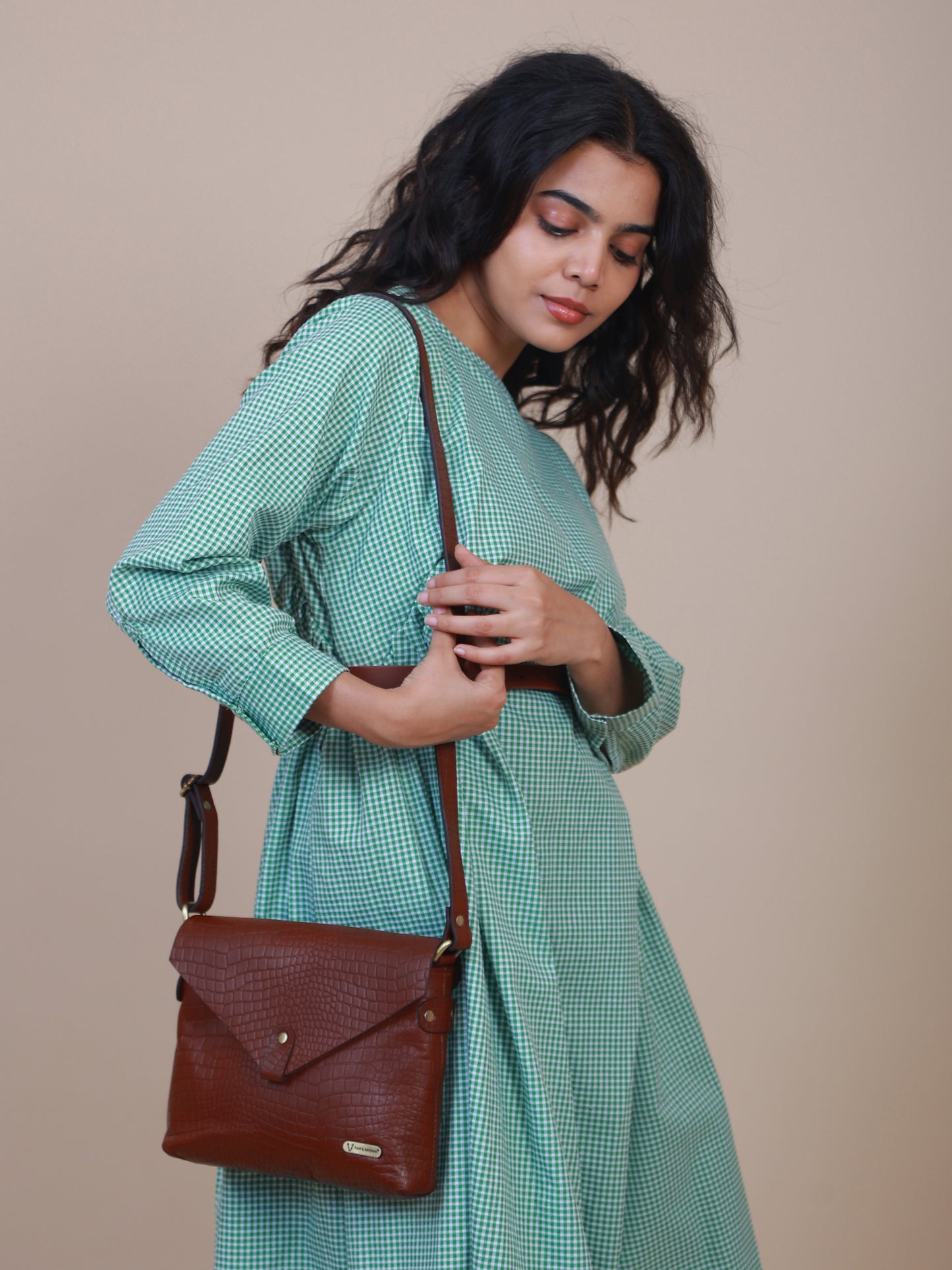 women's brown leather sling bag