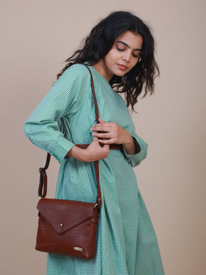 women's brown leather sling bag